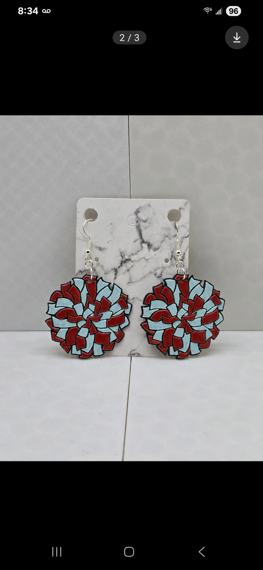 Pom-pom cheer team earrings in red — real product photo